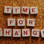Time for change mit Scribbel-Steinen geschrieben